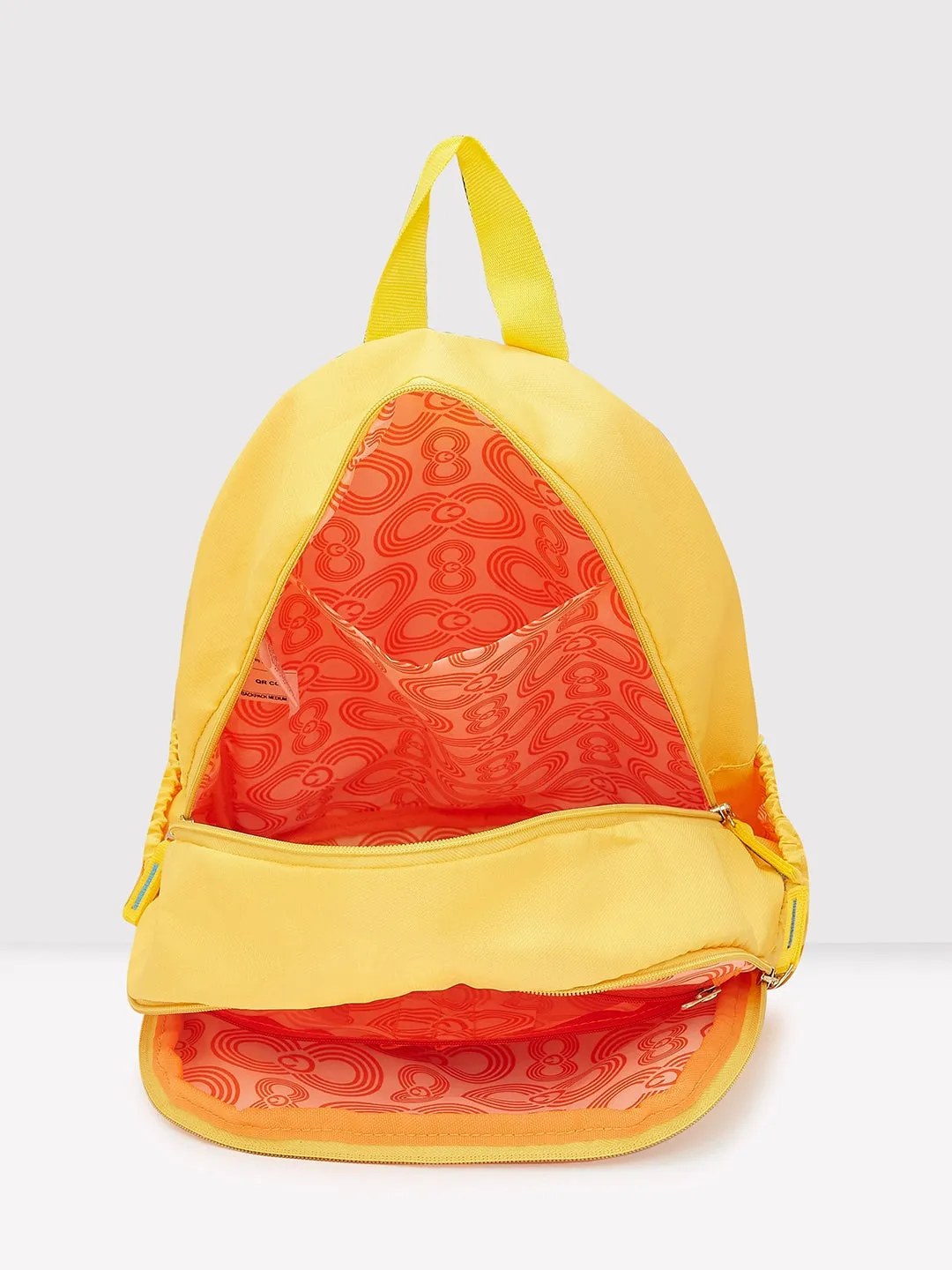 Caprese Xenia Medium Yellow Printed Backpack